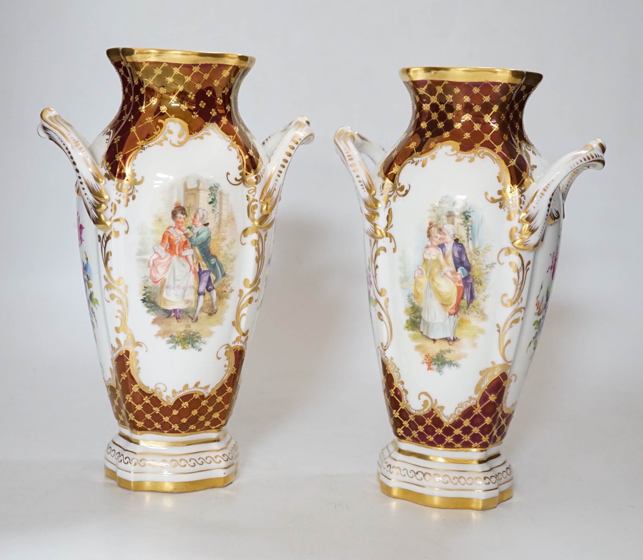 A pair of Potschappel porcelain vases, 20cm